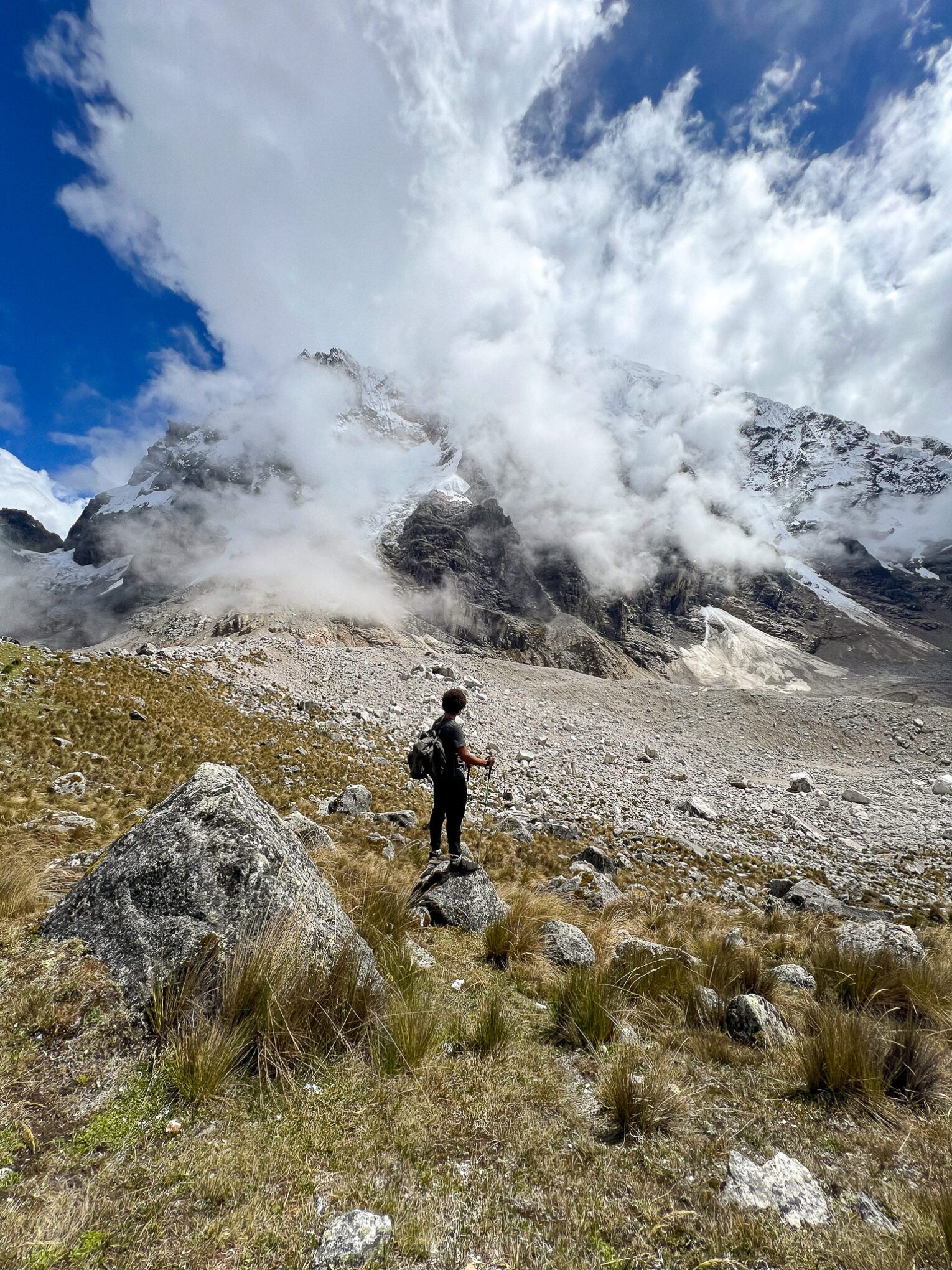 Salkantay Pass Kelvyn standing on a rock looking out to Salkantay mountain