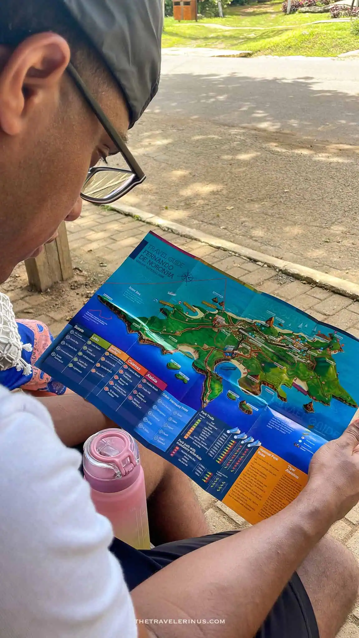 kelvyn looking at a map of the island, Fernando de Noronha 