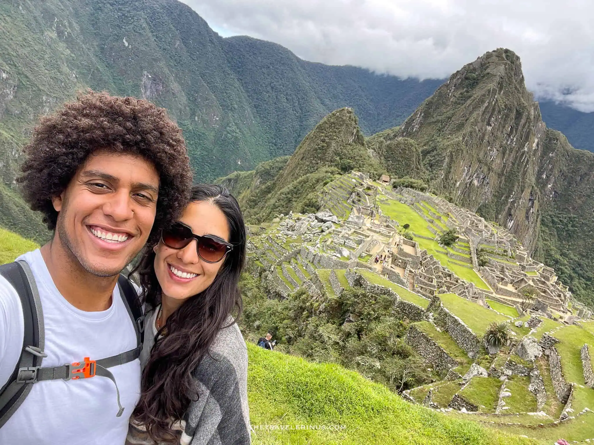 selfie of thais and kelvyn with Machu Picchu in the background 