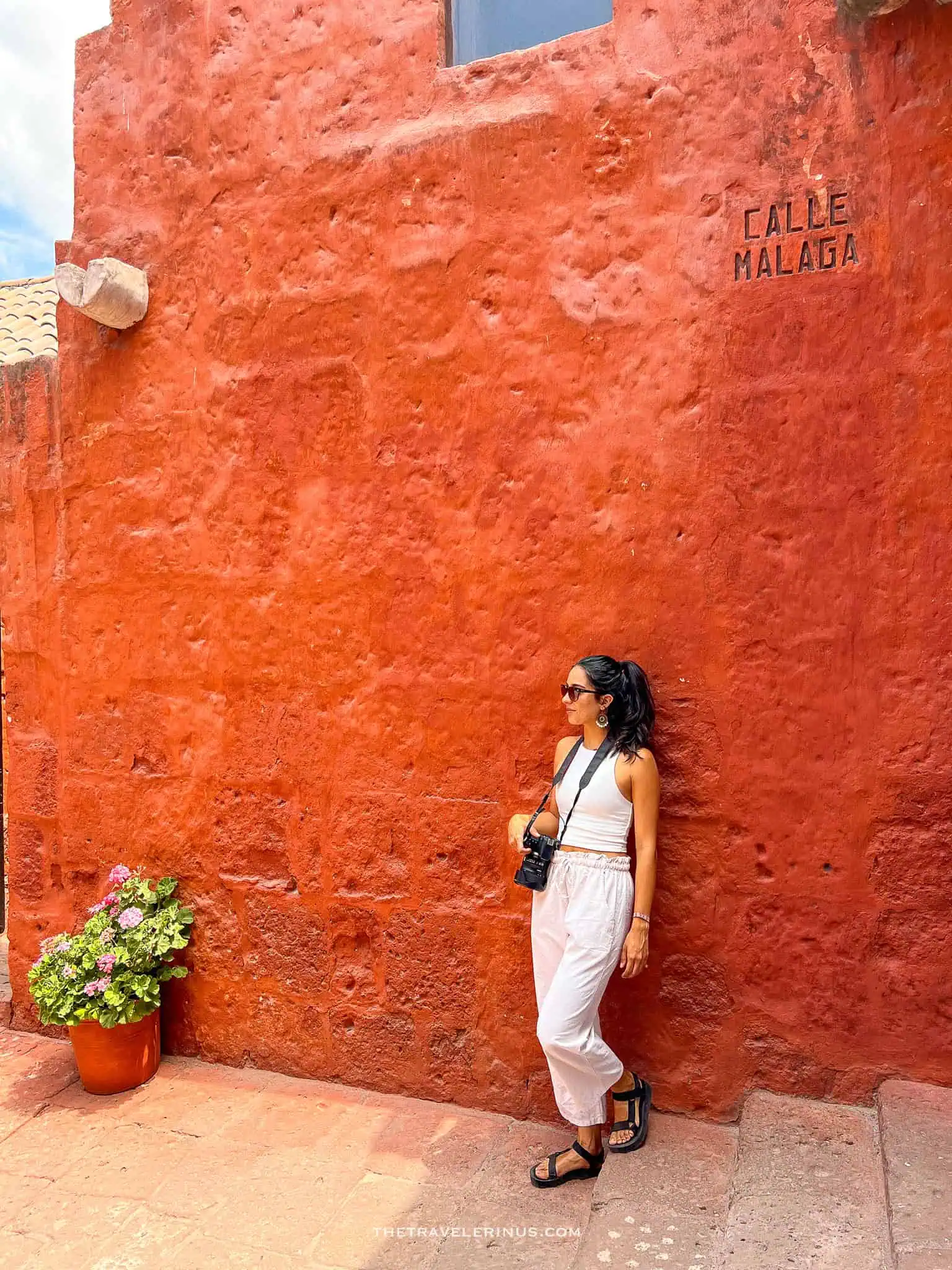 thais posing by wall in monastery Arequipa peru