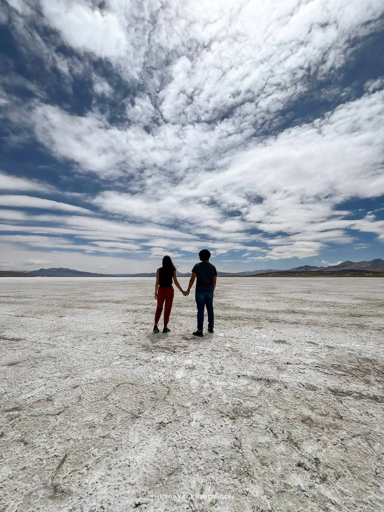thais and kelvyn standing in the Salinas Arequipa peru