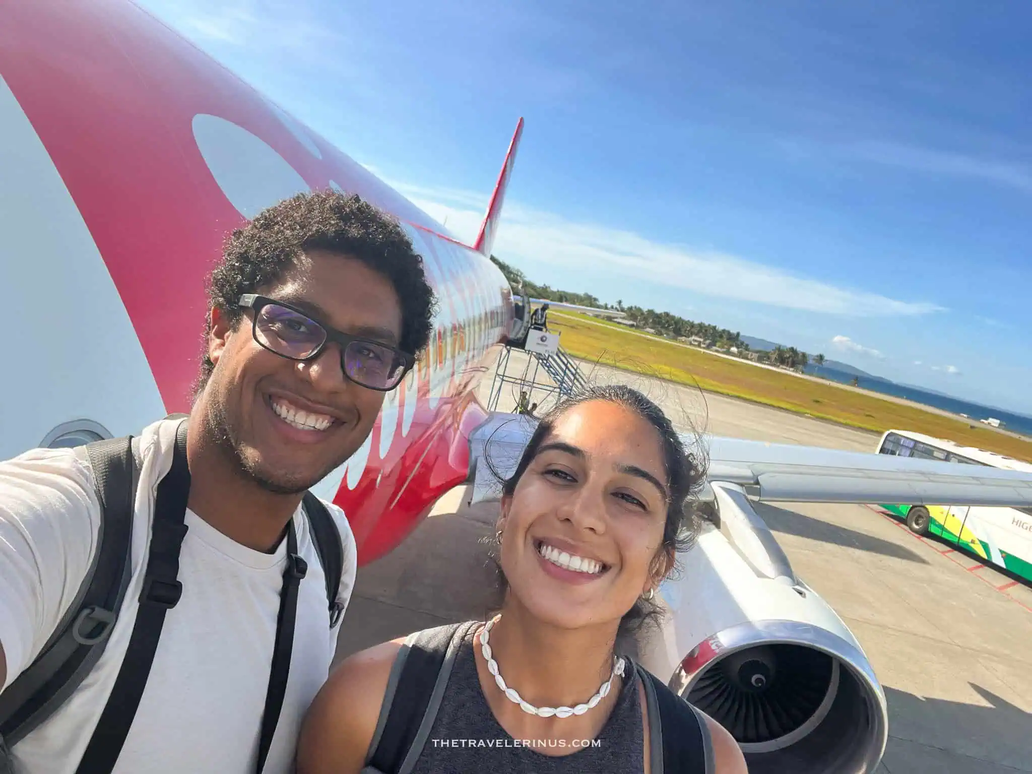 Selfie in front of an airplane traveling 