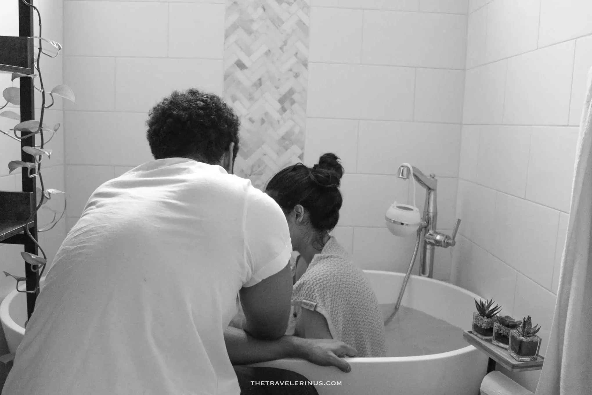 laboring in the tub during our home birth